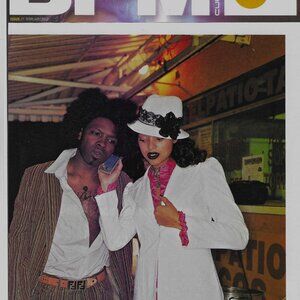 Anna Huling, white "peau de soie" blazer.